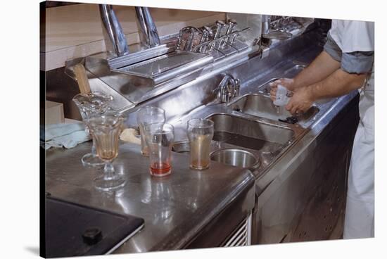 Washing Glasses at Diner-William P. Gottlieb-Stretched Canvas