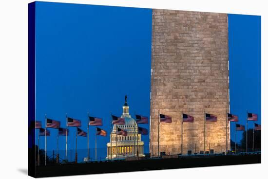 WASHINGTON D.C. - US Flags with cropped view of US Capitol and Washington Monument surrounded by...-null-Stretched Canvas