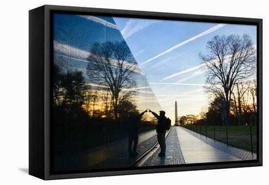 Washington DC - A Veteran Looks for a Name at Vietnam Veterans Memorial Wall at Sunrise-Orhan-Framed Stretched Canvas