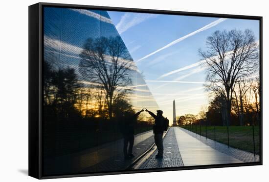 Washington DC - A Veteran Looks for a Name at Vietnam Veterans Memorial Wall at Sunrise-Orhan-Framed Stretched Canvas