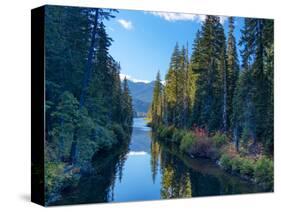 Washington State. Cooper Lake in Central Washington. Cascade Mountains reflecting in calm waters.-Terry Eggers-Stretched Canvas