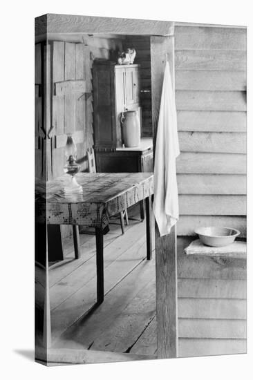 Washstand in the dog run and kitchen of sharecropper a cabin in Hale County, Alabama, c.1936-Walker Evans-Stretched Canvas