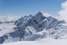 View on Winter Snowy Mountains and Blue Sky above Clouds, Krasnaya Polyana, Sochi, Russia-wasja-Stretched Canvas