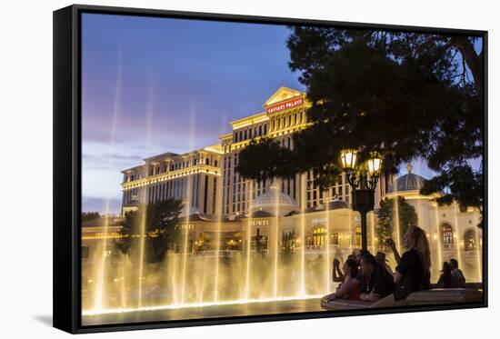 Watching the Bellagio Fountains at Dusk, the Strip, Las Vegas, Nevada, Usa-Eleanor Scriven-Framed Stretched Canvas