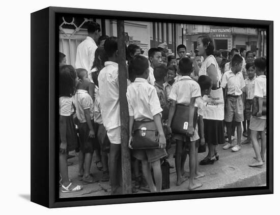 "Watchtower", Being Distributed in Streets of Bangkok-null-Framed Stretched Canvas