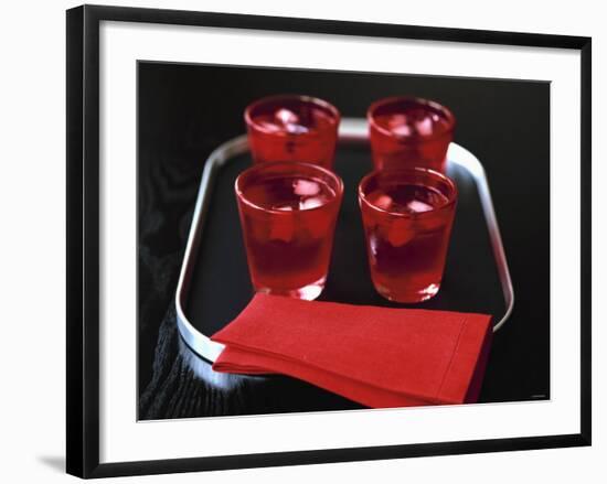 Water and Ice Cubes in Red Glasses on Tray-Michael Paul-Framed Photographic Print