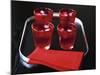 Water and Ice Cubes in Red Glasses on Tray-Michael Paul-Mounted Photographic Print