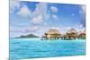 Water Bungalows of Pearl Beach Resort in the Lagoon of Bora Bora, French Polynesia-Matteo Colombo-Mounted Photographic Print