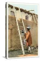 Water Carrier in Tesuque Pueblo, New Mexico-null-Stretched Canvas