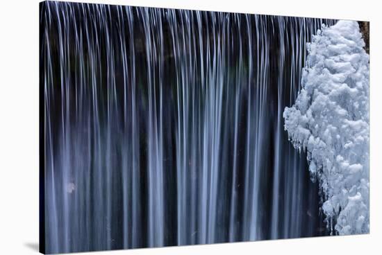 Water Flowes by Ice Formation Along Falls Creek in Winter Near Nelson, British Columbia, Canada-Chuck Haney-Stretched Canvas