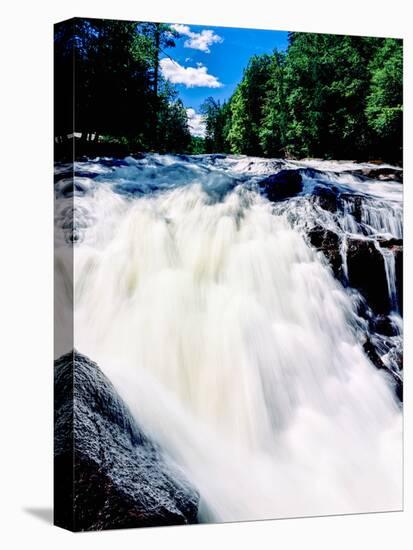 Water flowing from rocks in a forest, Buttermilk Falls, Raquette River, Adirondack Mountains, Ne...-null-Stretched Canvas