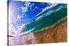 Water shot of a tubing wave off a Hawaiian beach-Mark A Johnson-Stretched Canvas