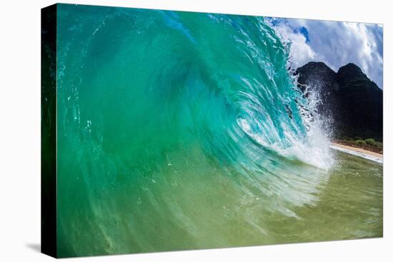 Water shot of a tubing wave off a Hawaiian beach-Mark A Johnson-Stretched Canvas