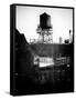 Water Tank on the Roof of Buildings in Manhattan in Winter-Philippe Hugonnard-Framed Stretched Canvas