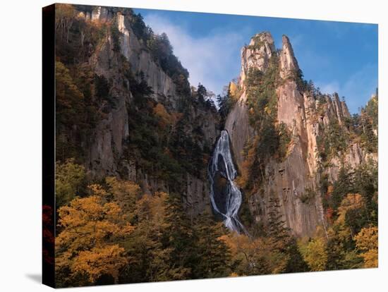 Waterfall cascading down cliff, Sounkyo, Hokkaido, Japan-Aso Fujita-Stretched Canvas