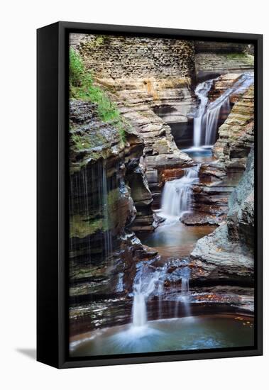 Waterfall Closeup in Woods with Rocks and Stream in Watkins Glen State Park in New York State-Songquan Deng-Framed Stretched Canvas