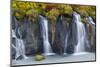 Waterfall Hraunfossar with colorful foliage during fall. Northern Iceland-Martin Zwick-Mounted Photographic Print