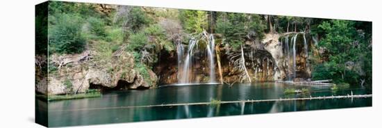 Waterfall in a forest, Hanging Lake, White River National Forest, Colorado, USA-null-Stretched Canvas