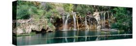 Waterfall in a forest, Hanging Lake, White River National Forest, Colorado, USA-null-Stretched Canvas