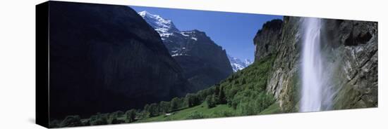 Waterfall in a Forest, Staubbach Falls, Mt Jungfrau, Lauterbrunnen Valley, Bernese Oberland, Ber...-null-Stretched Canvas