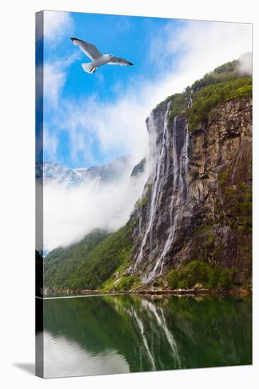 Waterfall in Geiranger Fjord Norway - Nature and Travel Background-Nik_Sorokin-Stretched Canvas