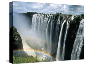 Waterfalls and Rainbows, Victoria Falls, Unesco World Heritage Site, Zambia, Africa-D H Webster-Stretched Canvas