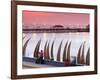 Waterfront Scene at Huanchaco in Peru, Locals Relax Next to Totora Boats Stacked Along the Beach-Andrew Watson-Framed Photographic Print