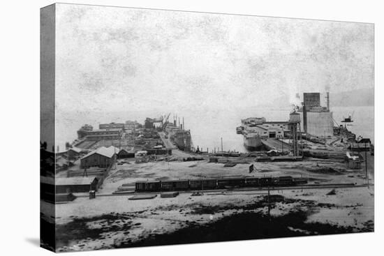 Waterfront warehouses at Astoria, OR Photograph - Astoria, OR-Lantern Press-Stretched Canvas