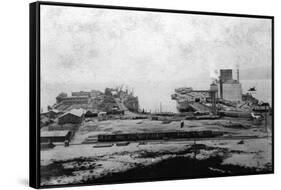 Waterfront warehouses at Astoria, OR Photograph - Astoria, OR-Lantern Press-Framed Stretched Canvas