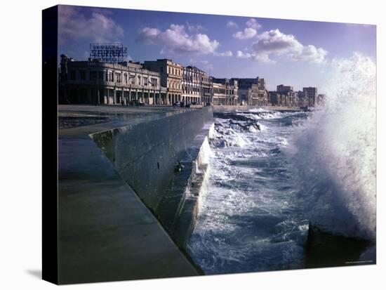 Wave Crashing Against a Breakwater Along the Malecon, a Waterfront Boulevard-Eliot Elisofon-Stretched Canvas