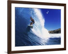 Wave Curling Up Over Surfer-null-Framed Photographic Print