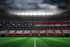 Football in Greece Colours at Back of Net against Football Pitch under Green Sky and Spotlights-Wavebreak Media Ltd-Photographic Print