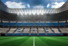 Digitally Generated White Leather Football against Vast Football Stadium for World Cup-Wavebreak Media Ltd-Stretched Canvas