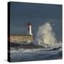 Waves breaking against port wall with lighthouse during storm-Loic Poidevin-Stretched Canvas