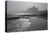 Waves Breaking at Bamburgh Beach Looking Towards Bamburgh Castle on a Misty Morning-Ann and Steve Toon-Stretched Canvas