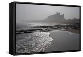 Waves Breaking at Bamburgh Beach Looking Towards Bamburgh Castle on a Misty Morning-Ann and Steve Toon-Framed Stretched Canvas