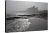 Waves Breaking at Bamburgh Beach Looking Towards Bamburgh Castle on a Misty Morning-Ann and Steve Toon-Stretched Canvas