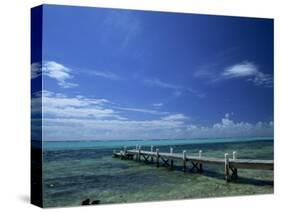 Waves Breaking on Reef on the Horizon, with Jetty in Foreground, Grand Cayman, Cayman Islands-Tomlinson Ruth-Stretched Canvas