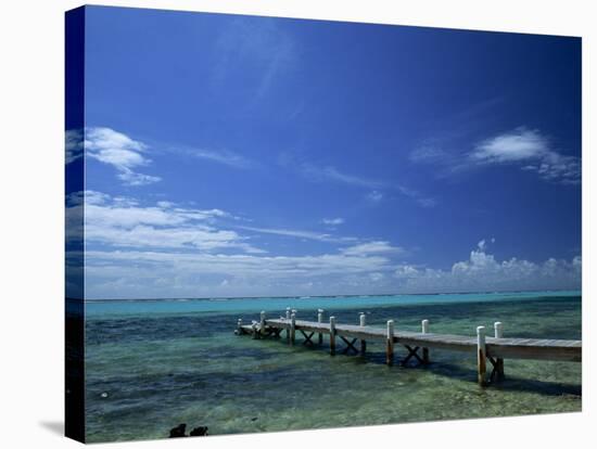 Waves Breaking on Reef on the Horizon, with Jetty in Foreground, Grand Cayman, Cayman Islands-Tomlinson Ruth-Stretched Canvas