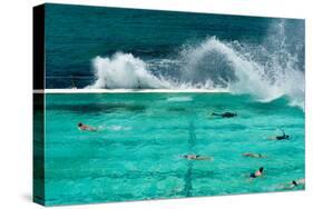 Waves Breaking over Edge of Pool of Bondi Icebergs Swim Club, Bondi Beach, Sydney-null-Stretched Canvas