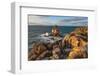 Waves crashing against rock stack at Cabo Carvoeiro in evening sunlight with Ilha da Berlenga-Stuart Black-Framed Photographic Print