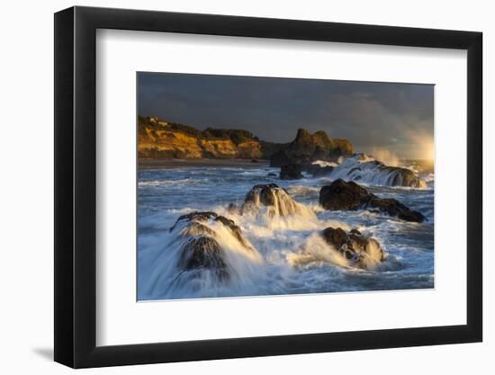 Waves crashing on rocks and washing down the sides at sunset-Sheila Haddad-Framed Photographic Print