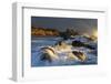 Waves crashing on rocks and washing down the sides at sunset-Sheila Haddad-Framed Photographic Print