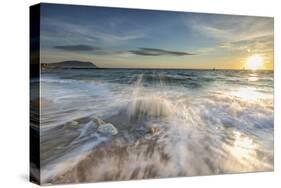 Waves crashing on the sandy beach framed by sunrise, Porto Recanati, Conero Riviera, Marche, Italy-Roberto Moiola-Stretched Canvas