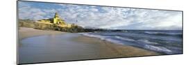 Waves on beach with Hacienda Cerritos hotel in the background, Cerritos Beach, Baja California S...-Panoramic Images-Mounted Photographic Print
