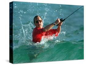 Waves Splash President-Elect George Bush as He Casts a Line While Surf-Fishing-null-Stretched Canvas