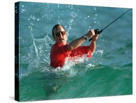 Waves Splash President-Elect George Bush as He Casts a Line While Surf-Fishing-null-Stretched Canvas