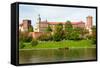 Wawel - Royal Castle over the Vistula River in Krakow (Poland)-majeczka-majeczka-Framed Stretched Canvas