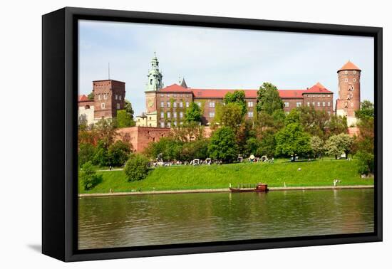 Wawel - Royal Castle over the Vistula River in Krakow (Poland)-majeczka-majeczka-Framed Stretched Canvas