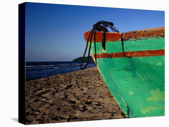 Weathered Wooden Boat Prow on Beach, Tela, Atlantida, Honduras-Jeffrey Becom-Stretched Canvas